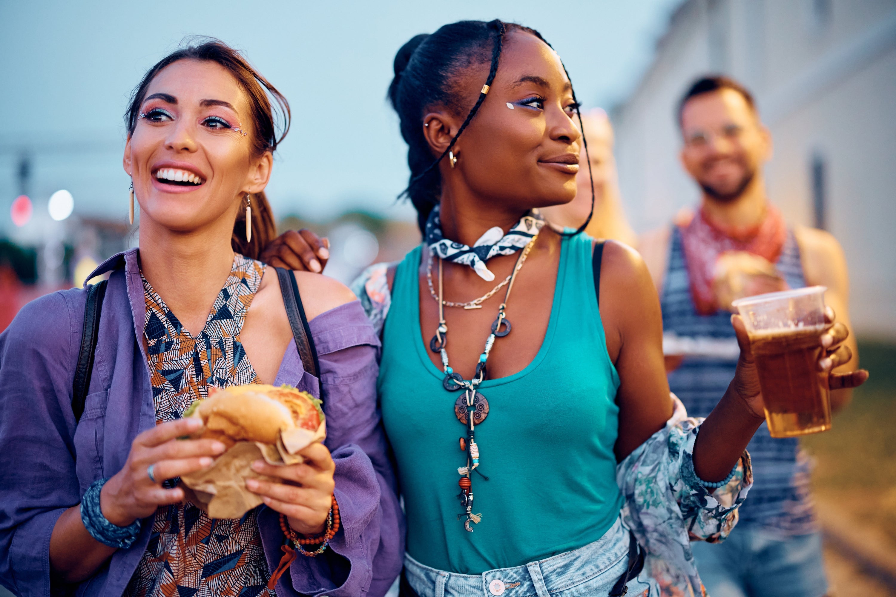 two women enjoying festival wearing Lash Quickies